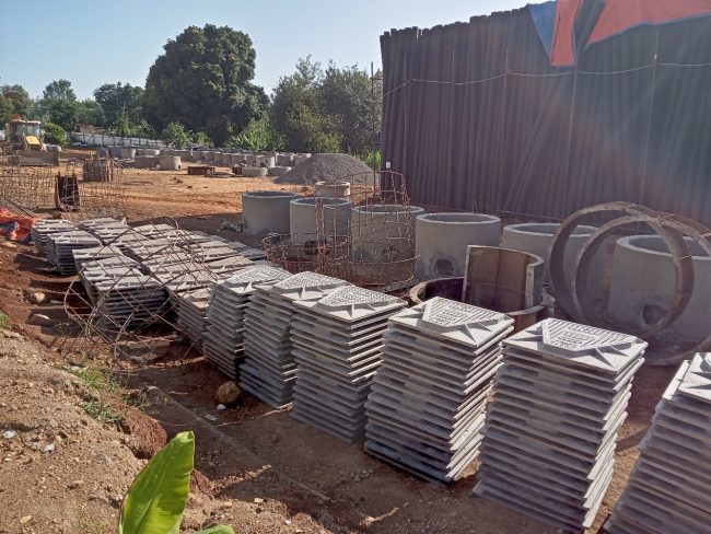 Precast Concrete Manholes, Manhole Covers and DWC-HDPE pipes under storage at Contractor’s Camp in Rukindu, Chuka